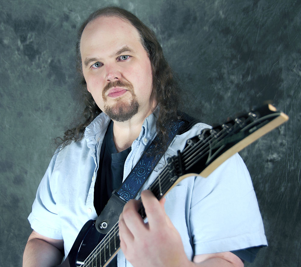 James Michael House playing guitar